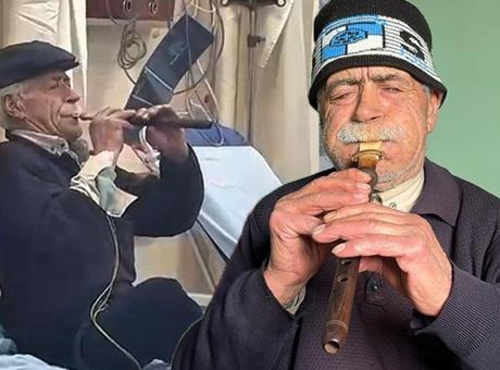 Kolunda serum elinde zurna! Acil serviste ilginç görüntü: 'Acımı hafifletiyor'